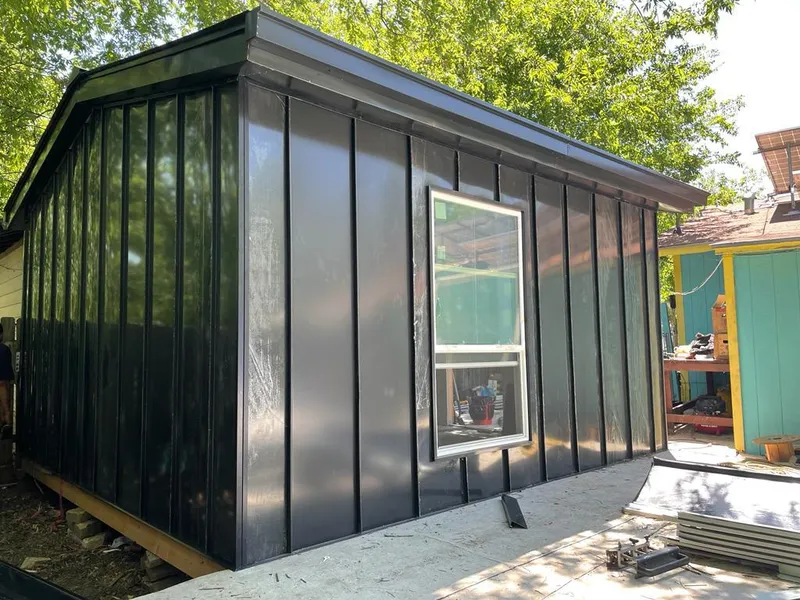 Black standing seam metal wall panels for Metal Roof Installation in Orion