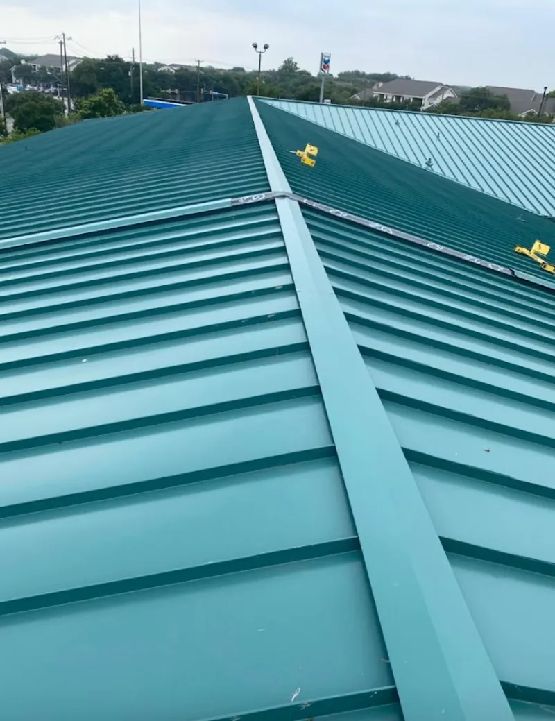 Green commercial metal roof ridge and valley for Metal Roof Repair in Orion