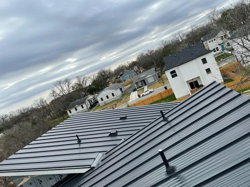 Standing seam metal roof panels with vents for Skylight Repair in Orion